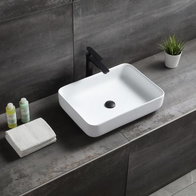 China Modern LUXSPA artificial stone counter top wash basin table top basin bathroom sink for sale