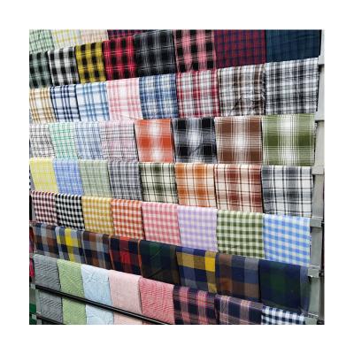 China Tear-Resistant Wholesale Lattice shirt wear-resistant 21 count polyester cotton woven jacquard clothing Tablecloth Decorative fabric fabrics for sale