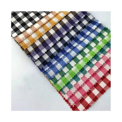 China Tear-Resistant Wholesale small grid polyester cotton 21 count plain weave color woven shirts dresses bags cushions decorative fabrics for sale