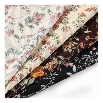 China Shrink-Resistant Wholesale Corduroy Fabric Small floral 3mm high-quality polyester cloth children's clothing dresses home textiles luggage Shirt for sale