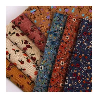 China Shrink-Resistant Wholesale of 8 pits of corduroy fabric small floral  high-quality polyester fabric fashion dresses home textiles bags shirts for sale