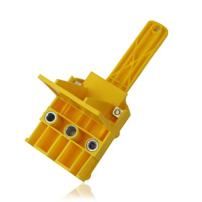 China ABS Plastic Straight Hole Woodworking Hand Held Connection Woodworking Board Drilling Punch Locator for sale