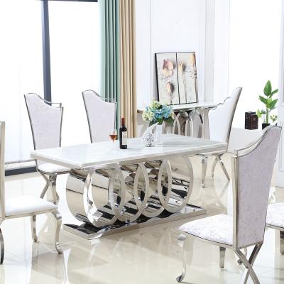 China Luxury Stainless Steel Base Bling Gold Visionary Home Bling Marble Top Dining Table for sale