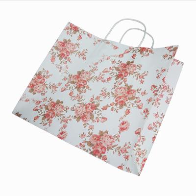 China Recycled Materials Factory Customized Clothing Shoes And Flowers Shopping Bag Cheap Paper Packaging for sale