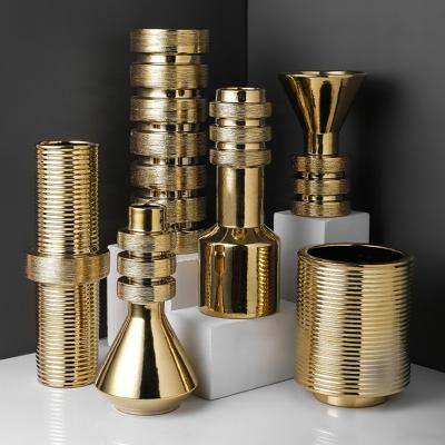 China Eco-friendly Nordic light luxury creative crafts plated gold and silver ceramic screw vase decoration ornaments for sale