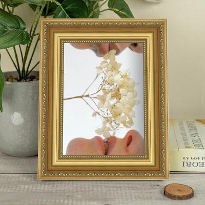 China Hot Selling Dongjin 2021 Inch A2 Gold Canvas Picture Frame Tabletop 5x7 6X8 8X8 4X6 4X4 8X20 For Table And Wall for sale