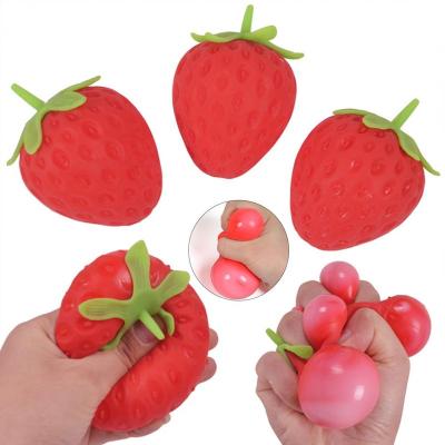 China Tpr Simulated Strawberry Squeeze Fruit Toys Stretch Strawberry Stress Ball for sale