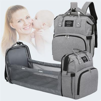 China With USB Travel Waterproof Baby Crib Mummy Backpack Foldable Diaper Diaper Bag With Bed for sale