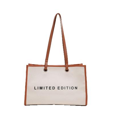 China Other 2022 Fashion Trend Large Capacity Material Zipper Canvas Letter Tote Bag Sling Shoulder Pack Women's Casual Handbags for sale