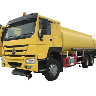 China Carbon Steel Sinotruk HOWO 6*4 Used Fuel Tanker Truc kLeft Hand Drive 10wheels Fuel Tanker Truck High Quality Standard Carbon Diesel for sale