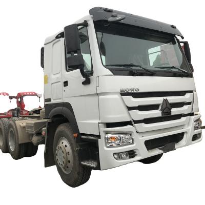 China Sinotruk Howo 6x4 tractor truck driving right or left is optional used main gross tractor head truck trailer tractor engine > 8L for sale