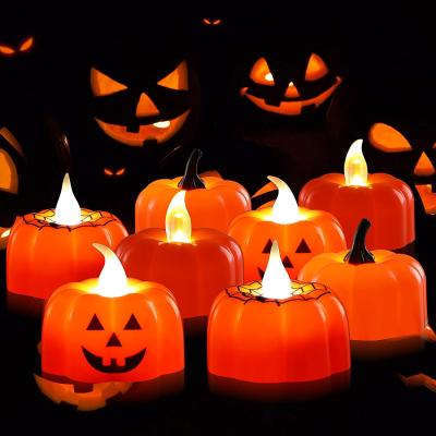 China Halloween 3D Pumpkin Candle Spider Web Tea Light Flameless Halloween Candle Lamp for sale