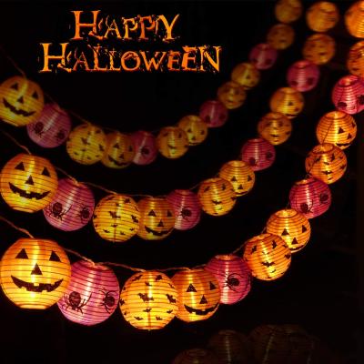 China Halloween Party Supplies Battery Operated Orange Scary Face Halloween Pumpkin String Lights for sale