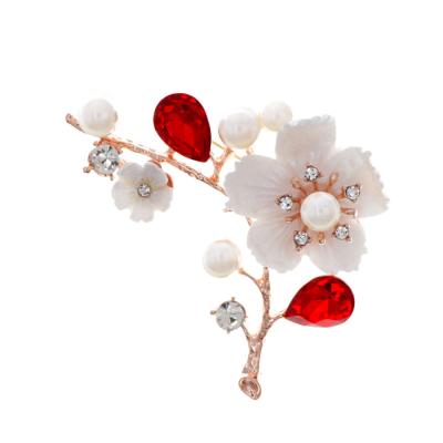 China 2022 Europe and America fashion shell plum material flower pins hot sale new customizable brooch pins for sale