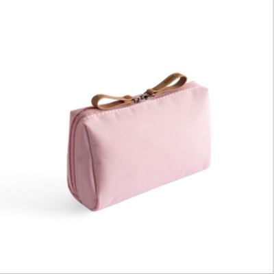 China Lady Wholesale Customizable Mini Style Cosmetic Bag Portable Hardware Travel Zipper Storage Eco-Friendly Bag for sale