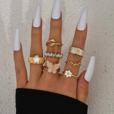 China Wholesale Multi Pieces Ring Set Romantic Small Daisy Hug Star Pentagon Butterfly Shaped Rings Soft Gold Plated Ring Set for sale