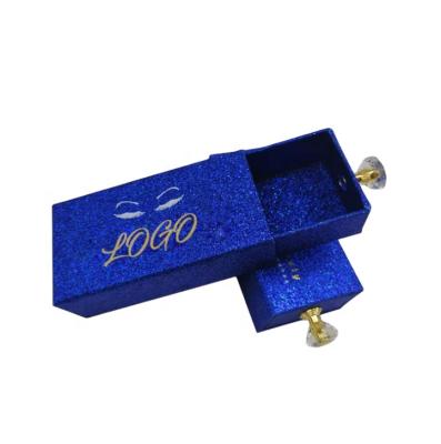 China Luxury Recyclable Blue Glitter Eyelash Drawer Box Packaging With Gold Handle for sale