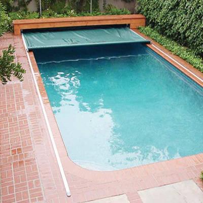 China Hot Selling Safety Rectangle Over Ground Woven Fabric PVC Tarpaulin Automatic Swimming Pool Cover for sale