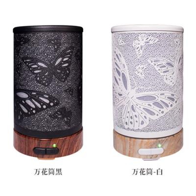 China Hotel Essential Oil Diffuser Ultrasonic Cool Mist Humidifier with Candle Light Effect Ion Aroma Diffuser for sale