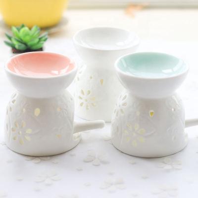 China Tealight Home White Ceramic Candle Holder Aroma Stove Oil Decoration Ceramic Oil Burner for sale