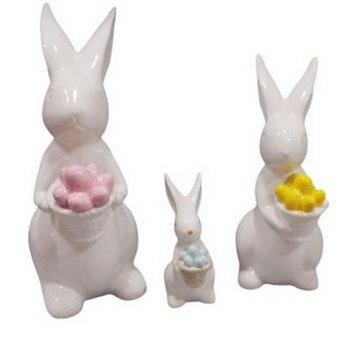 China Holiday decoration & 2021 New Gift Easter Bunny Figurines With Egg Porcelain Rabbits Ceramic Figurine for sale