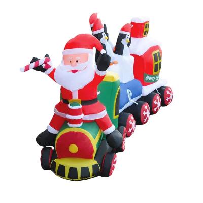 China Christmas Decoration/Santa Driving Train Decor Blow Up Commercial Outdoor, Yard Inflatable Christmas Santa Claus LED Driving Train Doll for sale