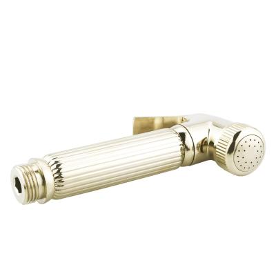 China 2021 New Wholesale Sefl-Cleaning Shiny Gold Premium Brass Handheld Bidet Sprayer for sale