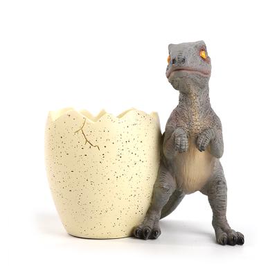 China 2021 New Design Dinosaur Resin Egg Pencil Case Decor Figurine Celebration Gift Kid Handmade Tabletop Animal Tourist Souvenir for sale