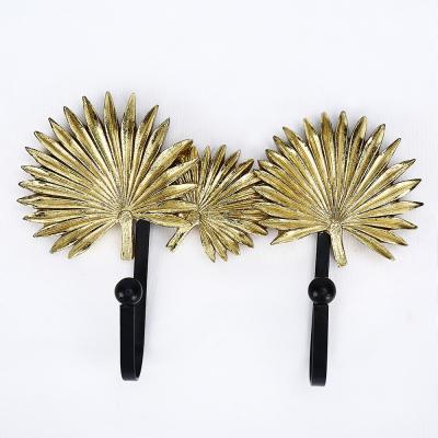 China Viable Antique Sundries Storage Bathroom Brush Gold Leaf Wall Coat Resin Hook for sale