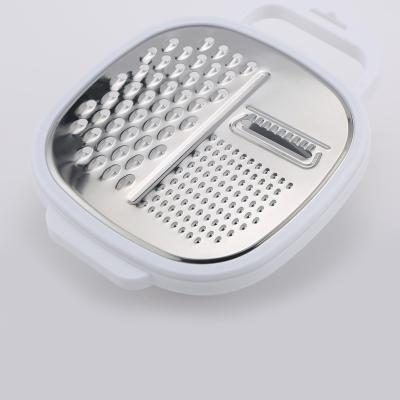 China Multifunctional Kitchen Instrument Soft Stocked Ginger Vegetables Butter Chocola Lemon Cheese Grater With Food Storage Box for sale