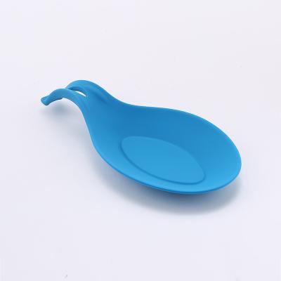 China Large Almond Shape Silicone Pocket Holder Kitchen Utensil Soup Spoon Heat Resistant Flexible Rest Stocked for sale