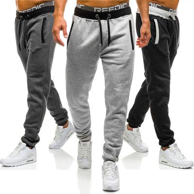 China Anti-wrinkle Shapershark Factory Men's Sports Plain Color Casual Loose Sweatpants Drawstring Cargo Pant Man Sweat Jogger Pants for sale