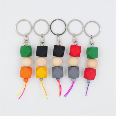 China Wholesale Hot Selling Creative Wooden Octagonal Wooden Bead Key Chain Car Key Chain Creative Short Lanyard for sale