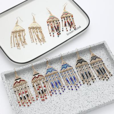 China New Triangle Earrings Women Long Rice Tassel Bead Bohemian Wholesale Big Earrings Ethnic Exaggerated Drop Earrings for sale