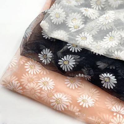 China Metallic Pink White Black Glitter Coated Flocking Mesh Sunflower Daisy Small Tulle Dress Fabric for sale