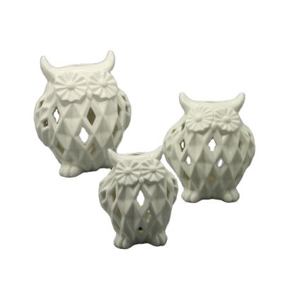 China Home Decoration Hollow Out Owl Design Ceramic Tea Light Candle Holder for sale