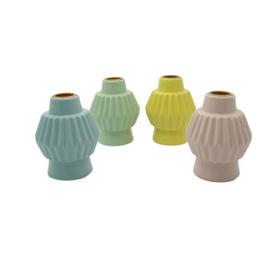 China Fashionable Wholesale Ceramic Tea Lights Candle Holders Oil Burner Home Decoration for sale