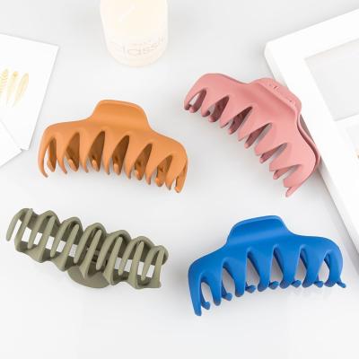 China Hair Decoration Wholesale Plastic Material Solid Color Cute shark Hair Clip Claw For Bath Shower for sale