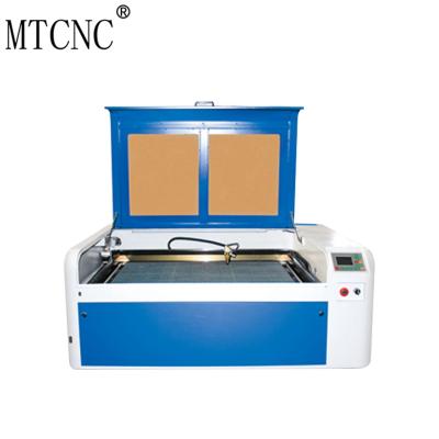 China Laser CUTTING CO2 Computer Fabric Laser Cutting Machine for sale