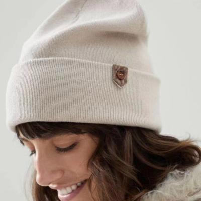 China 22 QUICK DRY autumn and winter women new since fashionable warm knitted cashmere hat pure earmuffs hat for sale