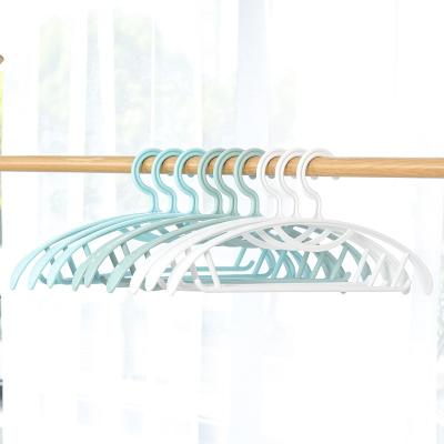 China Good Quality OEM Coat Rack Plastic White Green Hanger Casual Product Good Toughness For Clothing Store for sale