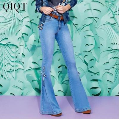 China New Style Breathable Mid Waist Lace Up Bow Tie Decorated Denim Pants Stretch Jeans Flared Pants for sale