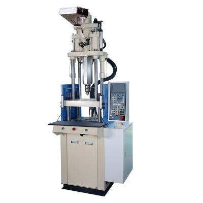 China VERTICAL fix table injection molding machine 1200/kn for sale