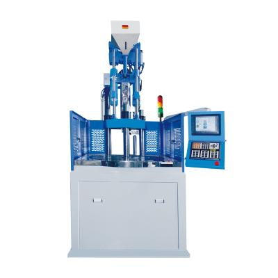 China VERTICAL 15 TON PFA FLUOROPLASTIC Auto Car Sealing Joint Band Over Molding Vertical Rotary Table Injection Molding Machine for sale