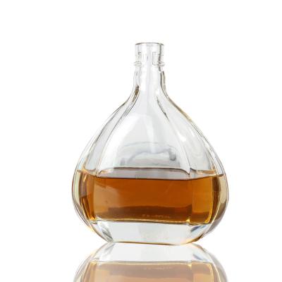 China Eco-friendly Handmade Customized Flat Round Sprints Glass Whiskey Glass Bottle 700ml for sale