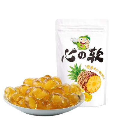 China Natural Pineapple Fruit Flavor Center Filled Snack Sweet Jelly Ball Soft Candy for sale