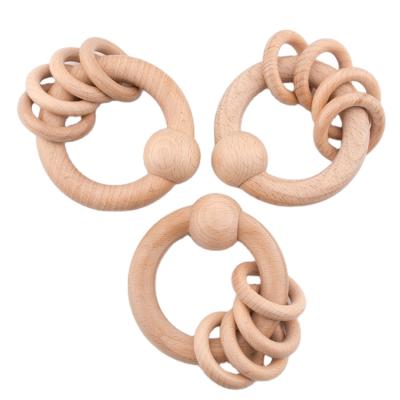 China Natural Eco Friendly Handmade Beech Wood Baby Teething Ring Toys Wooden Beads Heart for sale