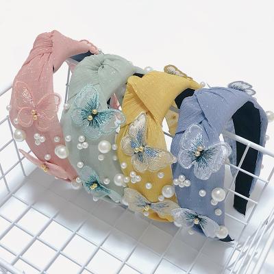 China 2021 Sweet Fashion Pearl Butterfly Headband Boho Hair Accessories Women Wide Brim Knotted Hair Accessories for sale