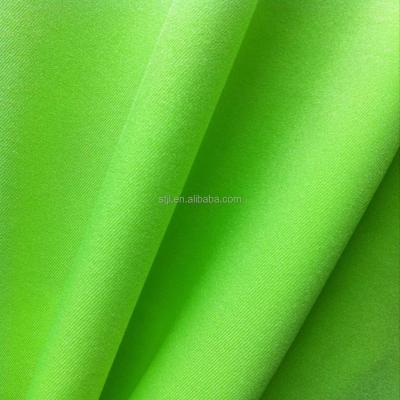 China Shantou factory seller spandex 160-210gsm 85 nylon swimwear gaiters stretch good shiny 15 knit fabric for sale