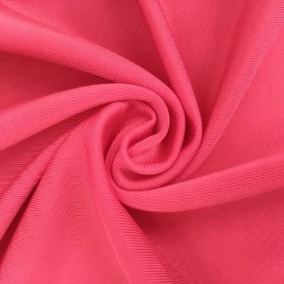 China Mexico knit 170-220 gsm 4-way stretch ship stretch semi dull polyester spandex knitted fabric for swimwear dance costumes for sale